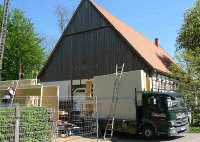 Nachhaltiges Bürogebäude für Holzhandel Sperrholz Wölbert mit Gründach